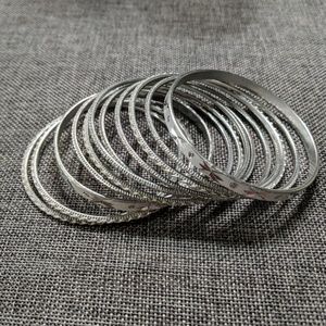 *3/$20* White & Silver Bangles